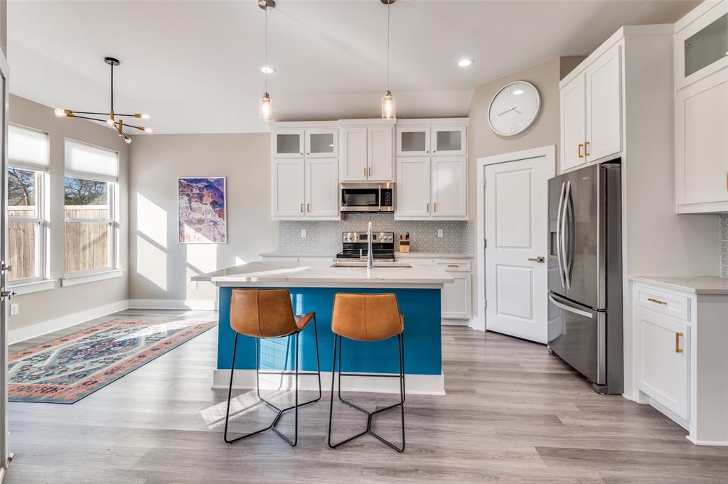 Wonderful family home built in 2023 and move in ready.  This one story, open floorplan has a kitchen with quartz countertops, island and a walk in pantry. Each of the Four bedrooms has a walk in closet and the primary suite has a large bedroom and oversized bathroom with soaking tub, big walk in shower, dual vanities and oversized closet. One of the bedrooms could easily be an office or nursery. There is a nice walk in utility room and covered back porch that opens out to a stone deck and big back yard. Just a half mile from the new Halperin Park and a block from The Dallas Zoo. A mile from Bishop Arts and 2 miles from downtown. Lots of sunshine from energy efficient double pane windows and cellular shades that open from top and bottom.  Second bathroom has tub shower with pretty inset tile accents. Smart lighting controls and dimmers inside, dimmable soffit lights outside, wall accent lights and a heavy slider gate across the driveway.  Great time to get in to the neighborhood!
