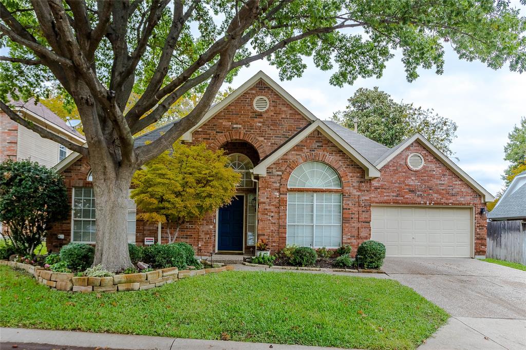 AMAZING updated home in highly sought after Stonebridge Ranch Community. Single story & well maintained. This is a contractor's home pay attention to all the details and updates. Gorgeous WOOD floors & soaring ceilings! 3 bedrooms with split location for privacy. 2 full baths. 2 car garage. Roof new in 2008. HVAC in 2020. Fence in 2010. Kitchen remodeled with all appliances in stainless steel. DOUBLE OVENS. Granite. Cabinets refinished. The family room is the heart of this home and features an updated floor to ceiling wood burning fireplace with gas logs & a wall of windows. The split primary suite positioned overlooking the private backyard! The primary bath features a separate shower, dual vanities, dual closets, linen closet, and updated tile plank floors. Baths have been updated with flooring, fixtures, and paint. Hot tub and deck added a year and a half ago, Exterior paint recent and beautiful landscape exterior lighting added. All light fixtures and CF updated.