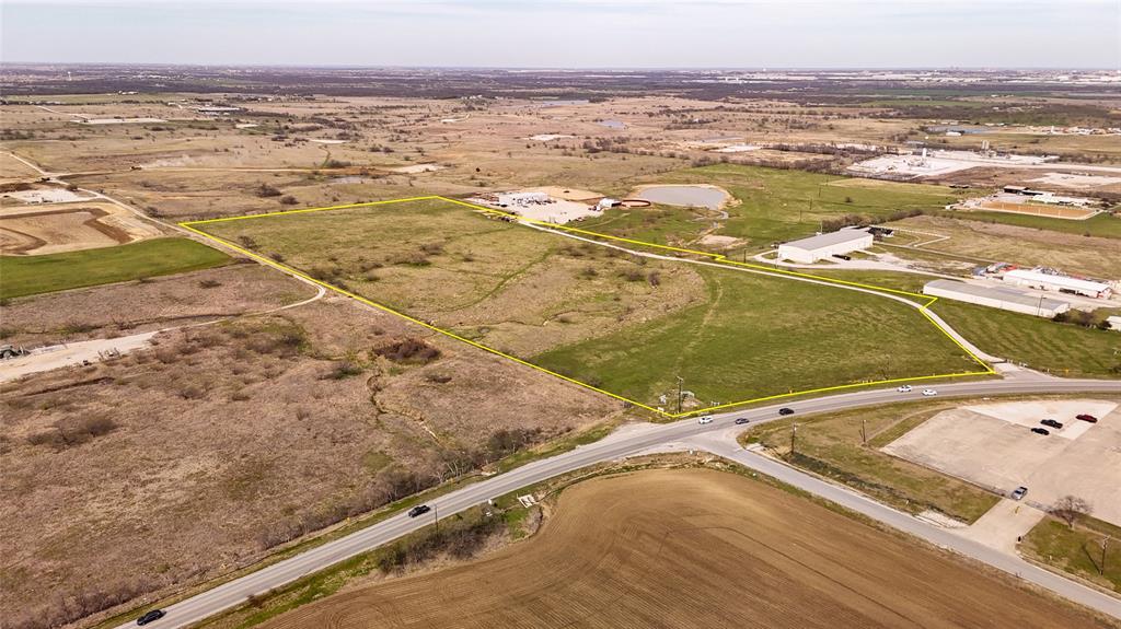PRIME 28.45 acres centrally located in the middle of several residential developments with over 18,000 homes planned. The north and west fence line borders a development with over 1,800 homes going in. Property has over 440 ft of road frontage on FM 2449 with plans, according to Ponder's thoroughfare plan, of a four lane road on the entire western fence line giving this property a hard corner. Great tract to buy and hold and let everything develop around it. Property is currently ag exempt. Please call with any questions.