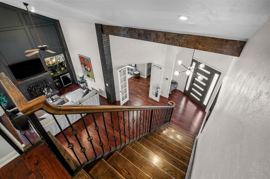 Tucked into one of Dallas’ most sought-after neighborhoods, this two-story hidden gem is within walking distance to parks, restaurants, local shops, neighborhood amenities, & a community pool available through voluntary membership.
Featuring 2 bedrooms, 2.5 bathrooms, a dedicated office, and a 1-car garage, the home offers an open and functional layout designed for comfortable everyday living & easy entertaining. The main level welcomes you with hardwood floors throughout, a spacious living and dining area, granite countertops, stainless steel kitchen appliances, a new kitchen faucet, wet bar, marble bathrooms, plantation shutters, wood blinds, and a fully updated powder bath.
Just off the dining area, enjoy a low-maintenance outdoor retreat— ideal for relaxing, entertaining, or enjoying quiet Dallas evenings with minimal upkeep.
Upstairs, the oversized primary suite feels like a private retreat, complete with new flooring, fresh paint, a sitting area, fireplace, improved closet, beautiful bath with a new vanity, private interior balcony overlooking the downstairs living space, and access to a 20x13 deck showcasing views of the Dallas skyline. The secondary bedroom also features its own private ensuite bath, offering comfort and privacy for guests.

One-of-a-kind custom details add warmth and character throughout the home, including green marble from the historic Magnolia Hotel, a hand-painted faux brick wall by a previous owner, and a charming patio mural inspired by the Italian countryside. Additional updates include a new garage door and opener system, new exterior paint, new front door, and solar panels for added energy efficiency. Refrigerator, washer, and dryer can convey.

With its unbeatable Bryan Place location, thoughtful updates, outdoor living spaces, skyline views, optional pool access, and truly unique architectural details, this home is a rare find near downtown Dallas.
