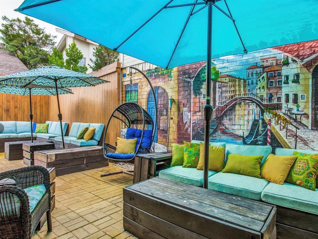 Perfectly located in the heart of Dallas, this hidden gem sits in the sought-after Bryan Place neighborhood, just minutes from downtown and within walking distance to parks, restaurants, local shops, and neighborhood amenities, including a neighborhood pool with voluntary membership. This beautifully maintained two-story home offers 2 bedrooms, 2.5 bathrooms, a separate office, and a 1-car garage with an open floor plan designed for easy living and entertaining.
Walk into your new home featuring hardwood floors throughout, fresh paint in the main living areas, a spacious living and dining area, granite countertops, stainless steel kitchen appliances, a new kitchen faucet, wet bar, marble bathrooms, a second bedroom with a private ensuite bathroom, a dedicated office, and a fully updated powder bathroom. Off the dining area, enjoy a low-maintenance outdoor space with new landscaping, pavers, turf, and a refreshed flowerbed — perfect for relaxing, entertaining, or enjoying Dallas evenings with minimal upkeep.
Upstairs, the oversized primary suite feels like a private retreat, complete with new flooring and paint, a sitting area, fireplace, improved primary closet, beautiful bath with a new vanity, private balcony overlooking the downstairs, and access to a 20x13 deck with views of the Dallas skyline.
Unique custom details add character throughout the home, including green marble from the historic Magnolia Hotel, a faux brick wall hand-painted by a previous owner of  a charming patio mural depicting the Italian countryside. Additional updates include a new garage door and garage opening system, new exterior paint, a new front door, plantation shutters, wood blinds, and solar panels for added energy savings. The refrigerator, washer and dryer can convey.
With its unbeatable Bryan Place location, thoughtful updates, outdoor living spaces, skyline views, paid pool access, and one-of-a-kind details, this home is truly a rare find near downtown Dallas.
