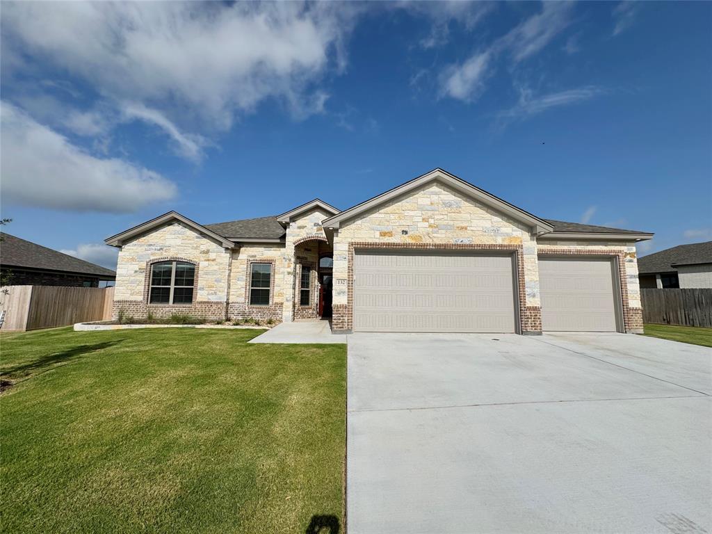 Discover a thoughtfully laid out design in the Nugget plan, offering 4 bedrooms, 2.5 bathrooms, a 3-car garage, and 2120 square feet of living space.
The beamed ceiling in the living room adds a touch of elegance, creating a nice ambiance for relaxing with family and friends. And with an electric fireplace, you can enjoy the flickering flames year-round, adding an extra layer of comfort to your home.
The spa-Like Master Bath is the epitome of relaxation. This space is designed to elevate your daily routine with features that go beyond the ordinary. From the vaulted ceilings, natural light, opposing vanities, dual-entry walk-in shower, and elegant garden tub, you will find the ultimate spot for relaxing and rejuvenation. 
Additional features include spray foam insulation, soft-close cabinetry, wood-look ceramic tile flooring, ceiling fans throughout, quartz countertops, modern GE Profile appliances, and a complete landscaping package. 
Rosenthal Estates is convenient to I-35 access and all the amenities of the greater Waco area. 
Schedule your tour today and see why Carothers Executive homes offers a Better Way of Living.