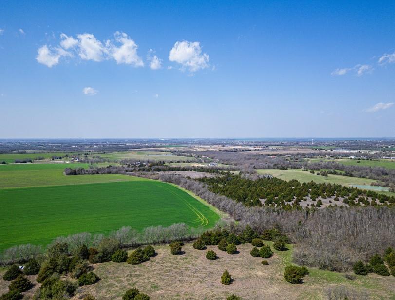 Beautiful acreage with gorgeous sunrises and sunsets and a picturesque lake. Great location between Royse City and Lavon. Unbelievable views and peaceful with FM 2755 access. Perfect for developing or building. Highly sought after growing area that has a country setting and just minutes from anything you may want to access. Multiple homes with additional land is also available and touches this property.