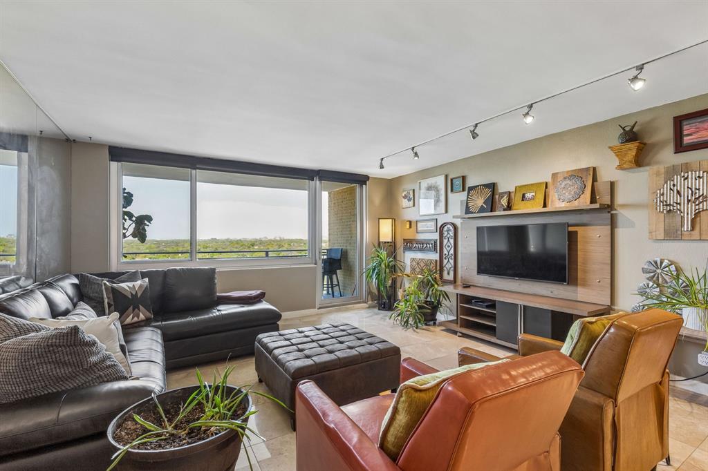 **Back on the market with improved price and 6 Month of HOA dues paid by seller with full price offer** Construction almost complete. Move in and enjoy the fresh new look of 21 Turtle Creek! This stunning one-bedroom, one-bath condominium combines style, comfort, and convenience. You’ll be greeted with breathtaking bird’s-eye views of Highland Park and Turtle Creek, offering an ever-changing canvas of natural beauty. Picture yourself savoring morning coffee or holiday lights twinkling below from your private balcony!

Step inside, and it instantly feels like home. Designer details abound, from custom glass inlay barn doors and accent walls to honey-toned cabinetry and warm travertine floors. For those seeking a seamless move, the condo is available fully furnished—move-in ready perfection.

Enjoy concierge service, valet parking, and all utilities included for true peace of mind. Relax by the serene pool and hot tub, stay active in the well-equipped fitness center and sauna, or unwind in beautifully manicured common spaces. Even your furry friends will love the on-site dog park.

Location-wise, it doesn’t get better than this. With a private gated entrance to the Shops at Turtle Creek Village, you’re steps away from Turtle Creek and a short stroll to the Katy Trail for outdoor adventures. West Village, Knox Street, and Oak Lawn’s vibrant dining and retail scene are all within easy reach. It’s city living at its finest—where every convenience and luxury is right at your fingertips. Don’t miss this incredible opportunity!