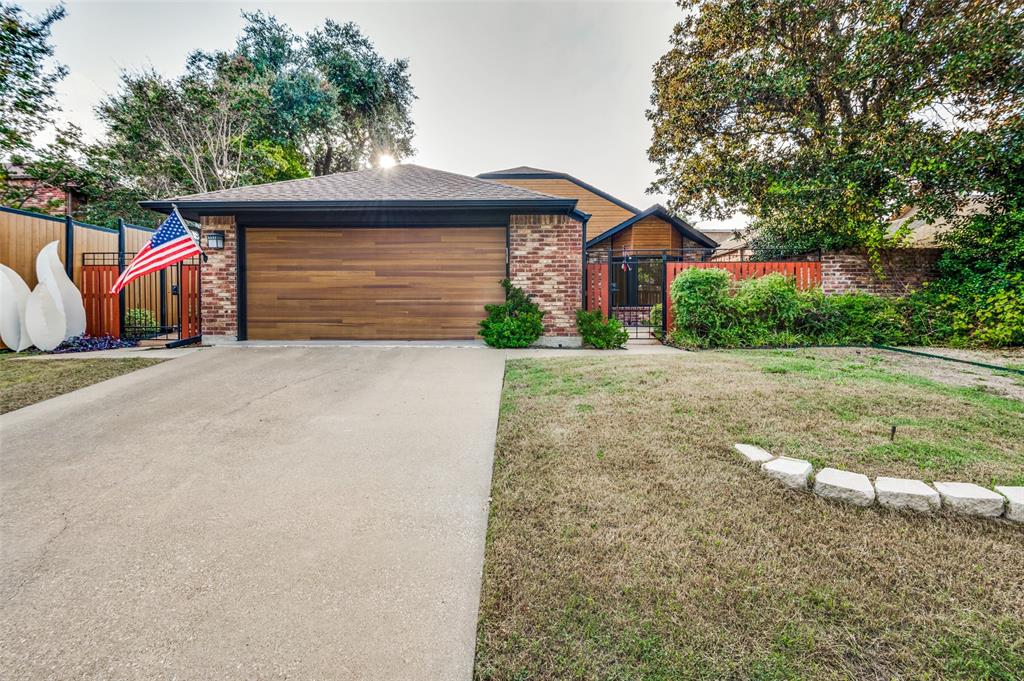 Charming garden home in the heart of Lake Highlands. Recently renovated, this home boasts fresh paint, brand-new carpets, new garbage disposal, and a generator. The open-concept design seamlessly integrates the living, dining, and kitchen areas, creating a versatile layout. Natural light floods the interior, thanks to a wall of windows that overlooks an enclosed patio and courtyard. Cozy up by the fireplace with gas logs on chilly evenings, adding warmth and ambiance to your home. The primary bedroom, generously proportioned includes heated floors, garden tub, separate showers, dual sinks, and a convenient walk-in closet. The second bedroom is adorned with charming bay window and boasts its own walk-in closet, providing ample storage space. Accompanied by a second full bath with double sinks. Additional features include a third bedroom or office, a water filtration system, and an attached garage with a electric lift system to the garage.