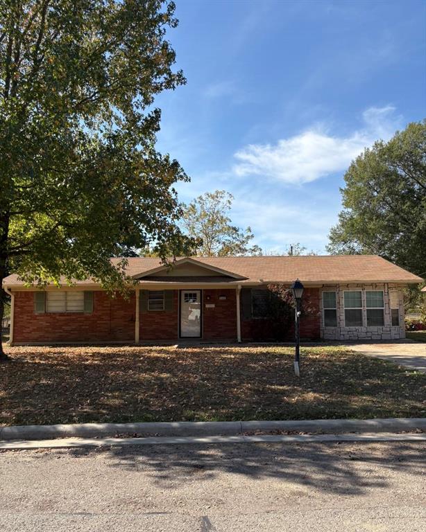 Welcome home to this updated 4-bedroom, 1.5-bath property nestled on a quiet street within the city limits of Paris, Texas. Situated on approximately 0.23 acres, this home offers the perfect combination of modern updates, functional living space, and a convenient location.
Step inside to find durable laminate flooring flowing throughout the home, creating a seamless and low-maintenance living environment. The updated kitchen features stylish white cabinetry, attractive countertops, and plenty of workspace for preparing meals and entertaining guests. The gas range, built-in microwave, and dishwasher will all convey with the property, making this kitchen truly move-in ready.
With four bedrooms, there's plenty of room for a growing family, home office, hobby room, or guest space. The updated bathrooms offer fresh finishes and modern appeal.
Outside, you'll enjoy a spacious yard with mature trees providing shade and character. The quiet neighborhood setting offers a peaceful place to call home while still being conveniently located near schools, shopping, dining, and other city amenities.
Whether you're a first-time homebuyer, growing family, or investor looking for a turnkey property, this home is one you won't want to miss! Seller will owner finance.