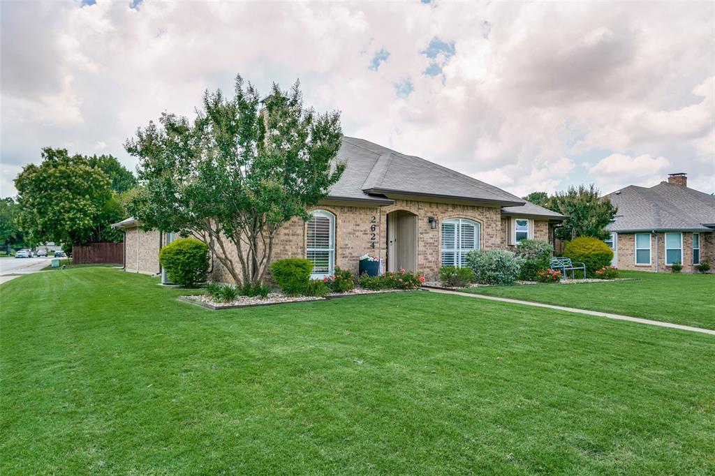 Nestled on an oversized corner lot, this impeccably maintained 3-bedroom home blends modern comfort with a warm and inviting atmosphere. From the moment you step inside, you’ll be captivated by the tastefully updated interior and abundance of natural light throughout. The beautifully appointed kitchen features granite countertops, sleek stainless steel appliances, ample cabinetry, and a charming breakfast nook perfect for morning coffee or casual dining. The open-concept layout flows seamlessly into the spacious dining and living areas, creating an ideal setting for everyday living and effortless entertaining. The private primary suite offers a relaxing retreat with an updated ensuite bath showcasing modern fixtures, a stylish vanity, and a walk-in shower. Secondary bedrooms are generously sized and complemented by fresh new carpet for added comfort. Step outside to discover one of this home’s true highlights — the expansive quarter-acre backyard. Whether you envision outdoor gatherings, gardening, a play space, or simply unwinding in your own private oasis, this oversized lot provides endless possibilities. Thoughtful upgrades throughout the home include a Lennox HVAC system, sprinkler system, new 8-foot fence, new front door, updated landscaping, new siding, plantation shutters, paid solar panels for impressively low energy bills, and more. Ideally located with quick access to George Bush Turnpike and DFW Airport, this charming home offers both convenience and exceptional livability in a highly desirable community. A true gem you won’t want to miss!