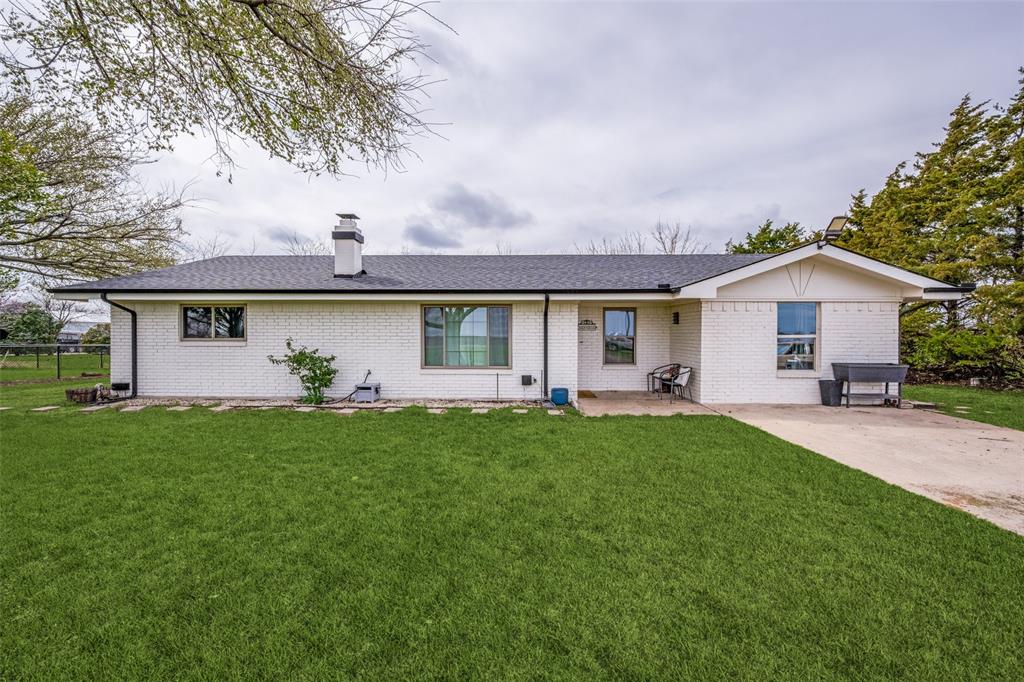Welcome to your own private slice of North Texas paradise—where modern upgrades meet peaceful country living on 2 unrestricted acres in Valley View (BORDERING ERA SANGER AND LOIS TX-ERA SCHOOLS!!!!)

Completely rebuilt down to the studs in 2021, this beautifully updated 3-bedroom, 2.5-bath home blends craftsmanship and comfort with thoughtful design throughout. Inside, you’ll find an open, light-filled layout featuring natural cedar beams, custom woodwork, and a handcrafted cedar pantry door that create a warm, one-of-a-kind feel.

The spacious layout flows seamlessly between the living, dining, and kitchen areas—perfect for both everyday living and entertaining. Recent updates include new flooring, fresh interior and exterior paint, upgraded windows, and a new patio door, offering a true move-in-ready experience.

Step outside and discover what makes this property truly special. Fully fenced with an automatic gate, the 2-acre lot provides space, privacy, and flexibility for a variety of lifestyles. Features include:

Oversized workshop with automatic doors

5-bay AIR CONDITIONED dog kennel setup ideal for breeders or boarding

Chicken coop and goat pen for animal enthusiasts

Fenced raised garden bed area for growing your own produce

Mature pecan, pine, and shade trees throughout

Enjoy wide-open views, stunning sunrises and sunsets, and the peace of mind of a concrete tornado shelter.

With NO restrictions, this property offers endless possibilities—whether you’re looking to live, work from home, or expand your hobbies or business.

If you’ve been searching for space, privacy, and true North Texas freedom, this is the one that stands out.