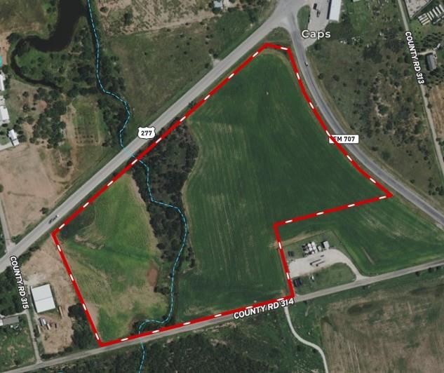 High-Exposure Corner Tract 

Don’t miss this rare chance to secure a premier corner tract at a heavily traveled intersection—a standout location for anyone looking to capitalize on growth and visibility.

Rural water is already available, and the current owner has four water meters reserved via view-caps water, ready to install, giving you a major head start on development. With dual-road frontage, excellent accessibility, strong traffic patterns, and minimal development restrictions, Tracts with this level of visibility are rarely offered.