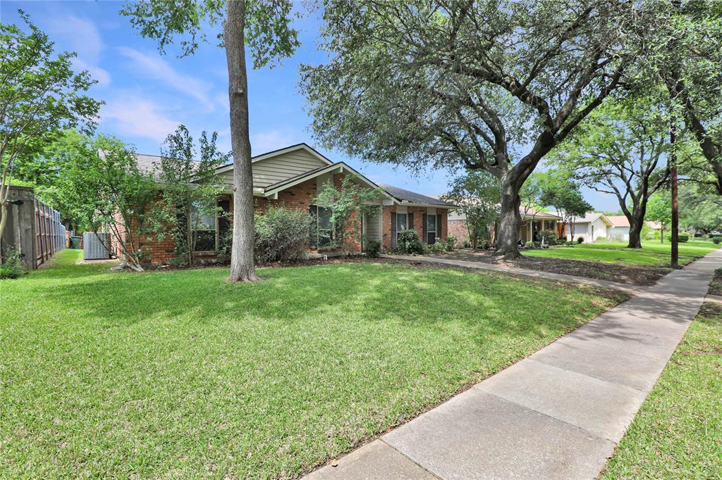 Charming single-story home in Plano with a sparkling pool, nestled on a mature tree-lined street. This updated 4-bedroom home offers many features: concrete and wood flooring throughout, two spacious living areas, and a functional layout perfect for everyday living and entertaining. Upon entry, you’re welcomed by a large formal living and dining room combination complete with a dry bar. The light and bright galley kitchen features stainless steel appliances, updated finishes, and easy access to the secondary family room with a cozy brick fireplace and vaulted ceilings accented by a wood beam. The oversized primary suite provides a private retreat, while the updated bathrooms add modern touches throughout the home. A huge mudroom offers exceptional storage and functionality. Step outside to enjoy the backyard oasis with a pool, grassy area perfect for pets or play, an 8-foot privacy fence, and a storage shed. This beautifully maintained home combines character, comfort, and great indoor-outdoor living in a prime Plano location.