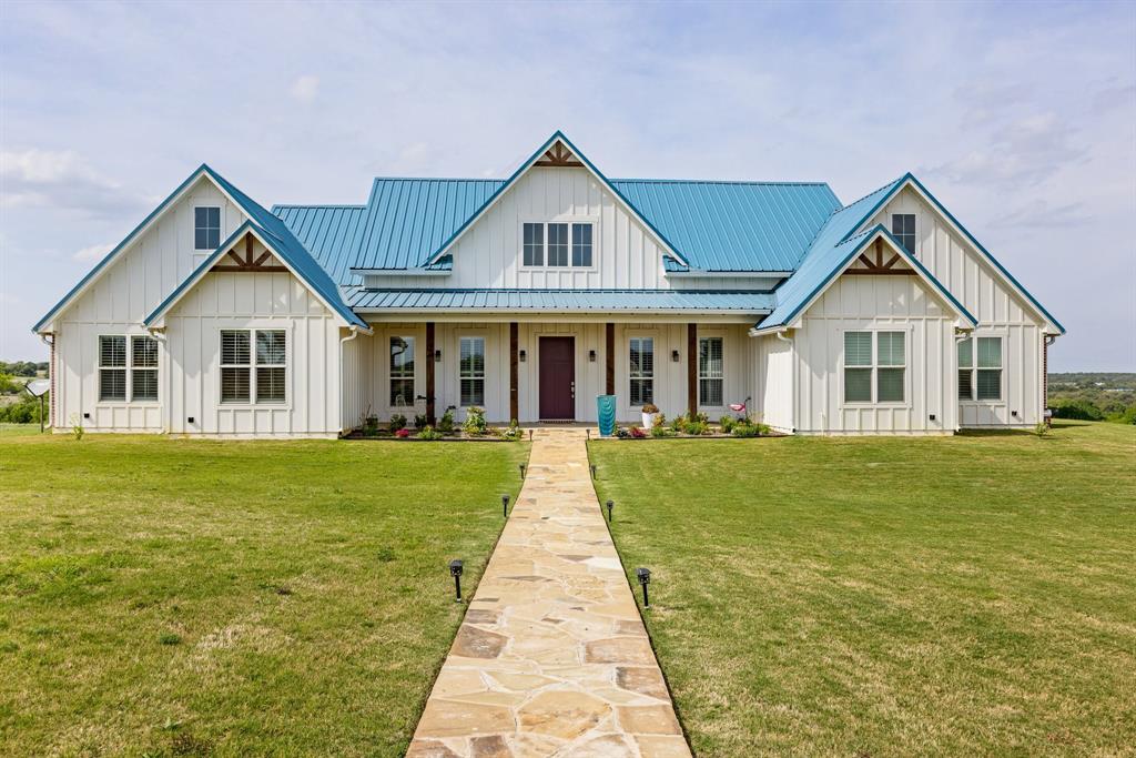 Beautifully built in 2023, this stunning 4-bedroom, 3.5-bath home sits on 6 peaceful acres in the gated community of Collier Ranch, tucked away on a quiet cul-de-sac. Enjoy serene country living with frequent deer sightings right from your back porch. Inside, the open-concept design offers a spacious and inviting layout, perfect for both everyday living and entertaining, complemented by elegant plantation shutters throughout.

The large 3-car garage offers excellent functionality, along with interior additional storage featuring stair access for convenience—ideal for future build-out as a bonus room, office, or flex space. This property blends modern comfort, thoughtful design, and natural beauty, making it a rare find in a highly desirable location.