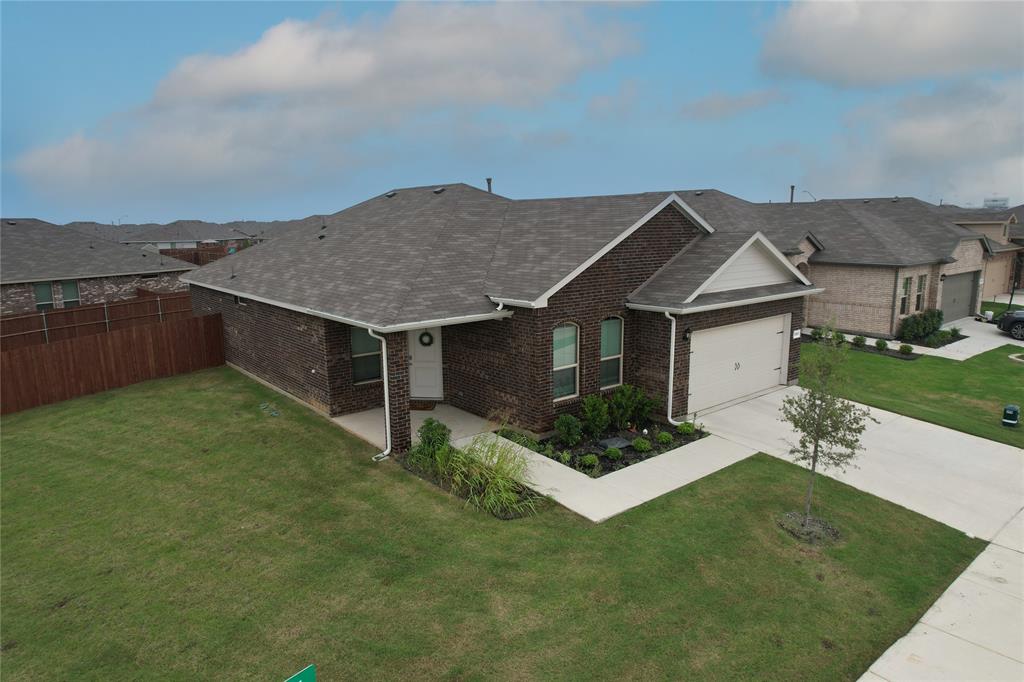 LOCATION! LOCATION! Your Dream Home Awaits! Welcome to this beautiful 2023 single-story home, ideally situated on a premium corner lot offering a blend of comfort, style, and functionality at Bailey Park, a desirable community in West Fort Worth and the highly sought-after Eagle Mountain Saginaw ISD. The home features 4 bedrooms, 2 full baths, a dedicated home office, and approximately 1,820 square feet of well-designed living space. The open layout seamlessly connects the living, dining, and kitchen areas, creating an ideal setting for both everyday living and entertaining. The kitchen is equipped with a spacious island, granite countertops, ample cabinetry, stainless steel Whirlpool appliances, gas range, built-in microwave, and a walk-in pantry. A split-bedroom design enhances privacy, while the primary suite offers dual vanities, an oversized shower, and a walk-in closet. Interior highlights include wood-look tile flooring in the main living areas, carpet in bedrooms, tiled entry and wet areas, and cultured marble vanities. Additional features include a Smart home technology package, a tankless water heater, and exterior features such as a covered front porch and covered back patio, full sod landscaping, sprinkler system, gutters, and a 6-foot fenced backyard. Community amenities include a pool and playground. Conveniently located near Highway 287, Highway 114, I-35W, the Alliance area, Downtown Fort Worth Stockyards, and Eagle Mountain Lake, with easy access to shopping, dining, and within walking distance to High school. This Like-New 4-bedroom home in Bailey Park offers modern construction, energy-efficient features, and a functional layout, ready for quick move-in. Schedule your showing today; your Dream Home awaits!
