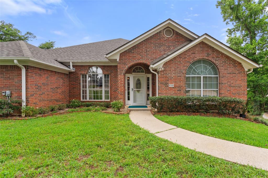 Custom-built, one owner home in beautiful Hideaway Lake, Texas.  This well-maintained property offers 3 bedrooms, 2.5 baths, and an incredible 6 car garage complete with RV-Telsa hook-up, perfect for car enthusiasts, hobbyists, boat storage, or extra workspace. 

The spacious living, dining, and kitchen areas are designed for easy living and effortless entertaining. Kitchen is oversized with island, eat-in area, buffet, desk and pantry. Custom built-ins throughout the living area, dining room, and kitchen provide both charm and functionality. 

Step outside to your own private, peaceful retreat. Elevated covered back deck overlooks heavily wooded lot, offering beautiful views and a tranquil setting where nature becomes part of your everyday life. Whether enjoying your morning coffee or entertaining guests, this backyard provides the perfect escape. 

The spacious primary suite offers a relaxing retreat with plenty of room to unwind. The side-entry driveway provides ample parking and is deep enough to accommodate a boat and multiple vehicles. This custom floor plan offers exceptional flow, abundant storage, and thoughtful design throughout. 

Generac Home Generator Systems conveys with the sale. Beautifully maintained and a new roof in 2026. The quality of construction is solid and the bones are great. 

Don't overlook this one, it's a home that truly must be seen to be appreciated. Please see the attached list of updates and improvements that reflect the pride of the original ownership found throughout.