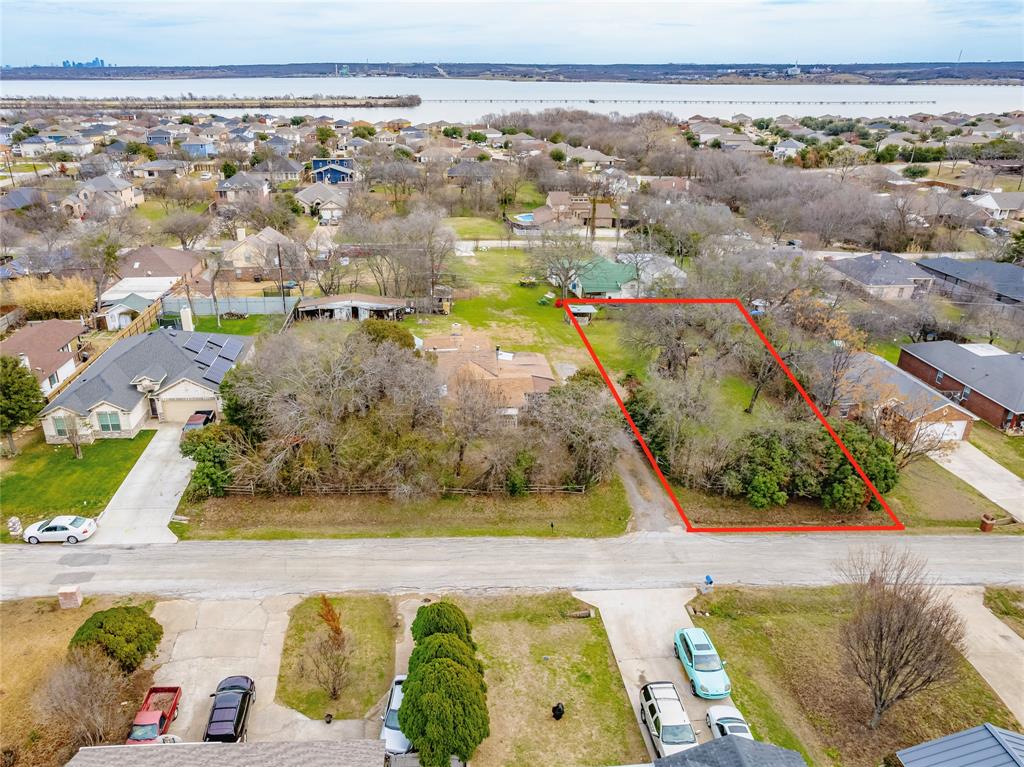 Once in a lifetime opportunity! Vacant lot perfect for building a beautiful home in an established neighborhood in the desirable area of Grand Prairie. Located next to an additional listing, totaling to almost .7 acres to build multiple homes on, or one large home with some extra land. One of the last vacant lots in this neighborhood. No blind offers. Buyer and buyer's agent to conduct their own due diligence. All information in this listing deemed reliable but not guaranteed. Please refer to MLS #20257062 for adjacent listing.