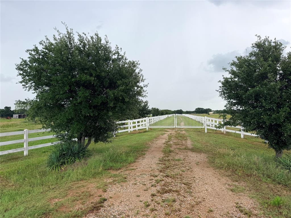 Exceptional 65-acre opportunity in the rapidly growing Aubrey area with outstanding future development potential. Ideally positioned near land recently purchased by Aubrey ISD for a new school, this property also benefits from a planned expansion of the nearby roadway to four lanes, adding long-term value and accessibility. Three-phase electric service is expected to be available soon, making the property even more attractive for residential, commercial, agricultural, or equestrian use.

The property is fully equipped for ranching and horse operations with extensive improvements already in place. Features include four tanks, including one large tank, a 60’ x 100’ barn complete with office, full bathroom, and kitchenette, a seven-stall horse barn with tack room, shop, outdoor round pen, 1,600-square-foot hay barn, and seven loafing sheds. The acreage is fenced and cross-fenced for functionality and ease of livestock management.

Additional improvements include a house with septic and Mustang water service, two water wells, and electric service through both CoServ and TXU. This is a rare chance to own a highly usable and strategically located property with strong investment upside in one of North Texas’ fastest-growing corridors.