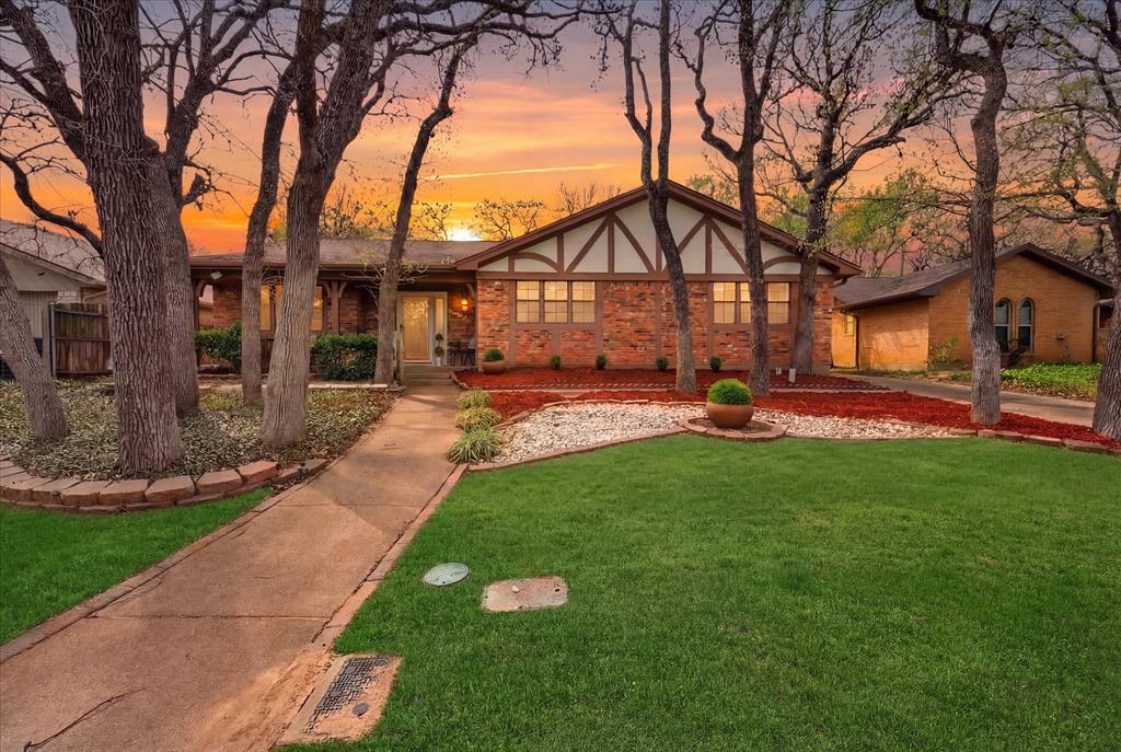 Welcome to your dream home in the heart of Arlington's highly sought after neighborhood in Arbor Valley featuring a charming front porch! This beautiful and  meticulously renovated from head to toe one-story ranch style residence exudes elegance and functionality from every corner.  3 spacious bedrooms, 2 luxurious bathrooms, and a dedicated office space, this home is perfect for both relaxation and productivity.  Spectacular updates include new paint and luxury vinyl flooring throughout, brand-new quartz countertops that gleam under chic designer lighting, hardware, faucets, and new stainless steel appliances and butler pantry create a gourmet kitchen experience like no other. Both bathrooms wow with newly designed walk in showers and fixtures. The open-concept living area flows effortlessly from kitchen to dining to the cozy sunroom, ensuring seamless entertaining or enjoying cozy family nights. Complete with a new roof and water heater, this home offers peace of mind alongside its stunning aesthetics. Each room has been thoughtfully designed with premium finishes for those who appreciate attention to detail. Situated with convenient access to Arlington's best shopping, dining, and top-rated schools, this property promises not just a house but a lifestyle upgrade. Embrace comfort without compromise—schedule your private tour today before this gem is gone!