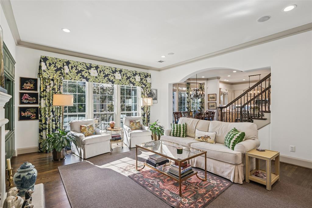 NO HOA, lock and leave, one-side attached townhome in coveted Mansion Park near Y’all Street financial district. If you are looking for 2300+ square feet w 3-bed, 3 & half bath, an open, entertainer ready floor plan and large dining area with treehouse vibes to the multi-seating living room with built-in bar, this property is ready for you. Extensive upgrades to kitchen: durable 3cm quartz countertop w an extended area over the island for eat-in seating; instant hot water dispenser; reverse osmosis water filtration; white ceramic backsplash; sink and high-end appliances including Fisher & Paykel dishwasher drawers. Refinished hardwood flooring & stairwell railings throughout. Added hardwoods to 3rd floor bedrooms and hallway. New epoxy flooring in garage (May 2026). All 3 full baths renovated w quality materials including floor & wall tiles, countertops, vanities, lighting, Kohler fixtures w lifetime warranty as well as insulation around all exterior facing pipes. Custom closets added in all 3 bedrooms. Natural light fills the interiors through the floor to ceiling window banks, highlighting the home’s architectural character; solid wood doors, molding and cabinetry hint to the quality workmanship of the property. The large bedrooms and well-proportioned living spaces make this multi-level townhome feel like a single-family home. Meticulously maintained. Other enhancements: class 4 shatterproof roof installed 2019; 6-inch gutters w downspouts; furnace air purifier for allergens; Rainbird Wi-Fi irrigation system in front; Hunter Douglas solar & black out blinds. Set back on the far side of the 6-unit complex away from the street noise, the property has a courtyard for outdoor socializing, a side yard ready for a dog-run & back yard set up for a grill. Low maintenance landscaping. Located close to the Katy Trail, Rosewood Mansion on Turtle Creek, Starbucks, Whole Foods & more. 15 min. to Love Field; 25 min. to DFW making this a great in-town residence or second home.