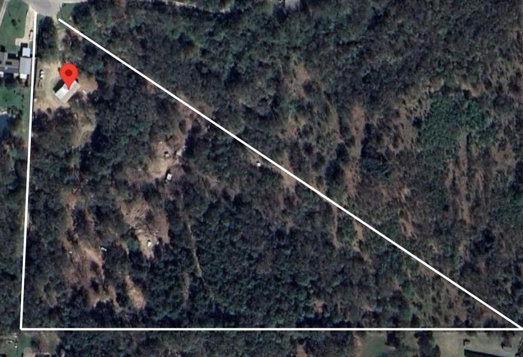 Tucked at the end of a quiet cul-de-sac in Grayson County, this just-over 9.5-acre retreat blends open pasture, animal pins, and mature woods—complete with two running creeks—for the perfect country setting with no HOA. Septic and electricity are already in place, so you can bring your plans, your animals, and start living the lifestyle you’ve imagined. Enjoy privacy and sweeping, rolling views while staying minutes from Pottsboro, North Texas Regional Airport, local shops and dining, with quick access to 1417 for an easy commute. Acreage like this is a rare find—come claim your slice of Texas countryside.
