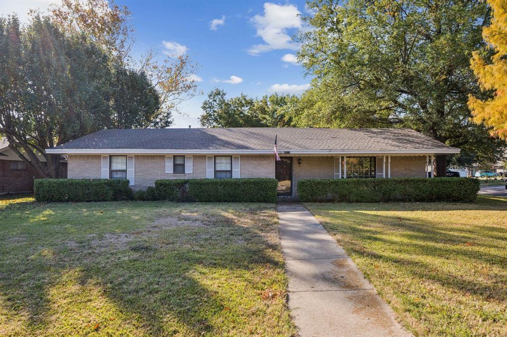 Welcome to 2311 Lange. This sprawling ranch style home is situated on a .25acre corner lot in the heart of the town of Greenville. 3 beds with 2 baths and a 2 car garage particularly located to the front of the house. Nice quiet cozy neighborhood situated with beautiful mature trees and direct access the I30 and plenty of shopping and dining around. Classy luxury vinyl flooring recently installed and carpet fill out the home with light use. There are 2 large living areas, while one has been a converted from the original patio that will add extra square footage to the homes tax roll information. Amazing character in an awesome intimate area all while the backyard comes with a lot of storage shed for any and or all of your yard equipment.