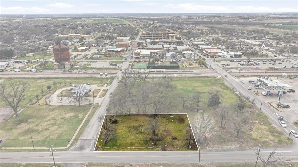 Position your investment in the heart of one of North Texas’ most dynamic growth corridors. Located just a short walk from Historic Downtown Celina, this highly visible corner commercial lot offers exceptional potential in a city experiencing explosive expansion and development. The property consists of two parcels being sold together, creating a combined site of just under half an acre. The parcels include 212 E Walnut Street (Celina Original Donation, Block 46, Lot 5A) and 106 N Oklahoma Drive (Celina Original Donation, Block 46, Lot 5C), forming a prominent corner location with strong accessibility and visibility.Situated within Celina’s Entertainment District, the property is ideally positioned for a wide range of commercial opportunities.  Its proximity to the vibrant downtown square places it within walking distance of local dining, boutiques, events, and community attractions that continue to drive both resident and visitor traffic.Celina’s rapid growth is fueled by its strategic location along State Highway 289 (Preston Road), with the Dallas North Tollway expansion to the west further enhancing regional connectivity and long-term investment potential. With limited commercial land remaining in downtown Celina, this corner site represents a rare opportunity to secure a presence in one of the fastest-growing cities in North Texas.