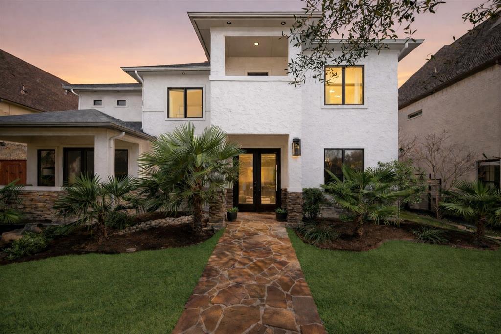 This is the one buyers wait for in Lakewood.
Fully updated with resort-style outdoor living just minutes from White Rock Lake.
Tucked on a quiet, tree-lined street, this stunning 5-bedroom home blends elevated design with effortless livability. From the moment you step inside, you’re greeted by natural light, soaring ceilings, and clean, modern finishes that feel both sophisticated and inviting.
The heart of the home is a beautifully designed Chefs Kitchen featuring premium SS Appliances, Coffee Bar, Custom Cabinetry, Custom Lighting, and an oversized Marble Island that opens seamlessly to the main living space—perfect for everyday living and entertaining. Walls of windows frame views of the backyard, creating a true indoor-outdoor connection.
The primary suite is a private retreat, complete with a spa-inspired bath, soaking tub, and generous walk-in closet. Upstairs, spacious secondary bedrooms and flexible living areas offer room for work, play, and everything in between.
Step outside to your own backyard escape—designed for year-round enjoyment with a pool and spa, multiple seating areas, Built in BBQ, and lush landscaping that offers both privacy and style.
Located in one of Dallas’ most sought-after neighborhoods, you’re just minutes from White Rock Lake, top-rated schools, and the best of Lakewood dining and shopping.
Move-in ready and priced to create immediate interest—this is a rare opportunity you don’t want to miss.