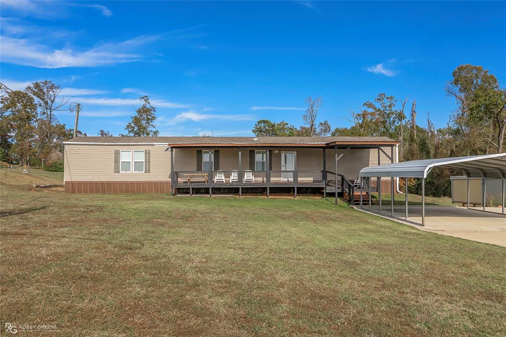 Great property for your next lake-side getaway home! Located mid-lake on Toledo Bend at the Pendleton Bridge, this property is close to restaurants, shopping, and marinas. With a private boat launch for the subdivision that's walking distance from the home and views of the lake from the front porch, this property is sure to impress! The open concept floorplan is perfect for spending quality time together, with the living room, kitchen, and dining area all flowing together. The kitchen features modern appliances and plenty of cabinet space. The bedrooms are all spacious with great storage room. The primary suite offers an ensuite bath for privacy and convenience, while the additional two bedrooms share a full bath. The real gem of this property is sure to be the access to the lake, stunning views at sunset, and plenty of room for outdoor activities like gardening or maybe installing a firepit. Don't wait, schedule your tour today!