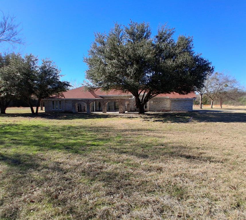PRICE IMPROVEMENT. MOTIVATED SELLER. Move in Ready! This great 4-bedroom brick home has been completely updated and is ready for a new owner! Great country location sitting on 2 acres in the Telephone community. This home offers a large open kitchen and family room with fireplace, vaulted ceiling, breakfast bar and tons of natural light. Additional formal living and dining room off the large entryway. There are 4 large bedrooms and 2 full and 1 half bathrooms. The main bedroom has a fireplace, 2 large walk in closets, double sinks, separate tile shower and a garden tub. Fresh paint, new luxury vinyl plank and carpeting, all new lighting throughout and more. The exterior has a huge front patio courtyard and a large open back patio, chain-link fenced back yard and several nice shade trees plus a 2 car attached garage and concrete pad for extra parking. This property has so much to offer for the money with over 2600 square feet of living area and centrally located between Paris, Bonham and Honey Grove amenities plus only a few minutes from several area lakes. Come take a look before it is gone!