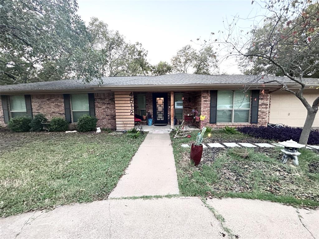Come see this lovely home that offers ample space for dining and entertaining. Hardwood floors throughout, built in cabinet in the kitchen to display your dishes, and plantation shutters in all the rooms! This home sits on a large corner lot with mature pecan trees shading the backyard. There is extra room for parking in the circular driveway. The sellers added modern updates throughout the home which  include a new cedar wood fence with 2 double gates and 2 single gates. The cedar posts and cedar panel that was added to the front porch add style and extra charm. The large address numbers, new steel designer front door and porch lights were well thought out. The sellers added new light fixtures throughout the home, installed cabinet doors in the mudroom, installed new tile in the laundry room and mudroom, put in landscaping, as well as installing a barn door in the primary bathroom. Don’t miss out on this charming home! It has so much to offer!