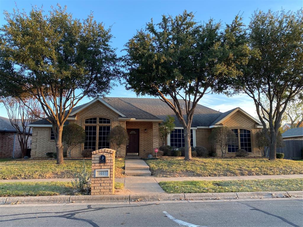 Charming home ready for you.  Perfect SW Arlington location w easy access to major highways and convenient to shopping and entertainment areas.  Lovely curb appeal invites you inside. Home has a warm comfortable feel to it.  Beautiful Laminate floor throughout the home and Tile in Kit and Baths. Window Blinds PLUS Solar Screens help keep summer heat out.  The formal dining room located to left of entry.  Eat In Kitchen offers loads of cabinet and counter space, Huge Sink, SS appliances, closet pantry plus dining area.  Enjoy time spent in the spacious Family Room gathered around the wood burning fireplace. Also included  are Wall Mounted TV Brackets to hold your flat screen TV. The primary bedroom suite is generously sized and includes a walk in closet and vanity with double sinks.  Two other ample sized bedrooms and second full bath complete the home. Sep Laundry area. Pet Restrictions. Use TAR application. Incl copy of DL and 2 recent pay stubs for each applicant 18 years or older.