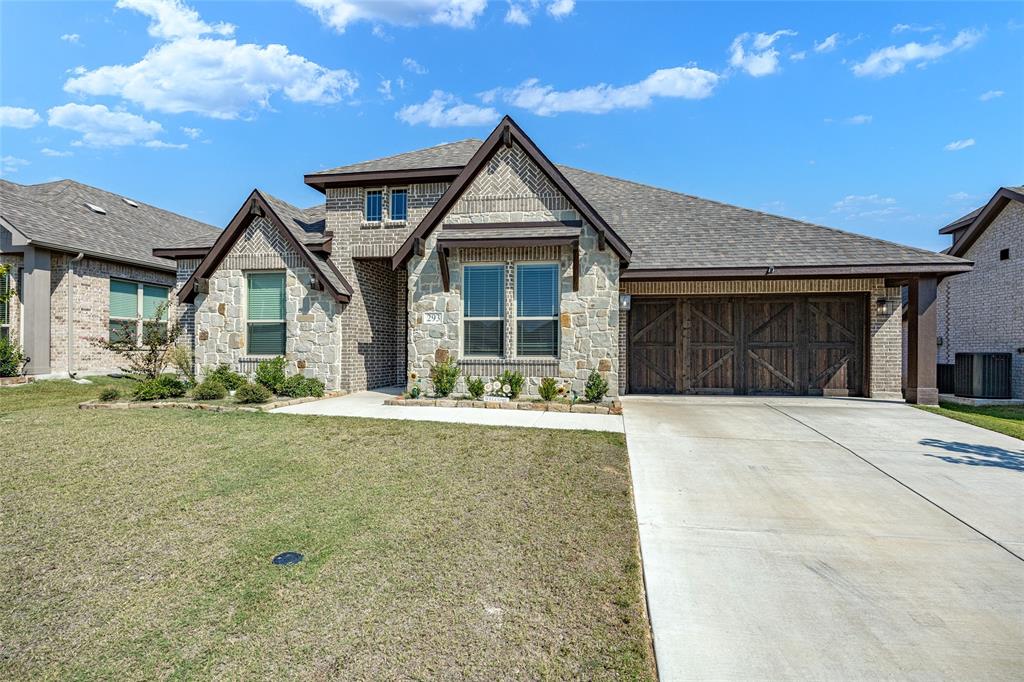 This Home will make you want to stop scrolling after you see the Oversized Utility Room and Flexible Media Space. Situated in The Oasis at North Grove, this single-story Bloomfield design offers 2,527 sq. ft. of open and functional living. The kitchen features granite countertops, stainless steel appliances, a large island with sink, and a walk-in pantry, flowing seamlessly into the spacious living area with natural light. The utility room is oversized, providing space for storage, laundry, or even a second fridge. A dedicated flex space media room offers versatility for a playroom, movie nights, or a private office. The primary suite includes dual vanities, soaking tub, separate shower, and a walk-in closet with laundry access. Two additional bedrooms and 2.5 baths complete the layout. Enjoy a covered patio, fenced backyard, and community amenities like clubhouse, trails, playgrounds, and pool—all within Waxahachie ISD and convenient to shopping and dining.