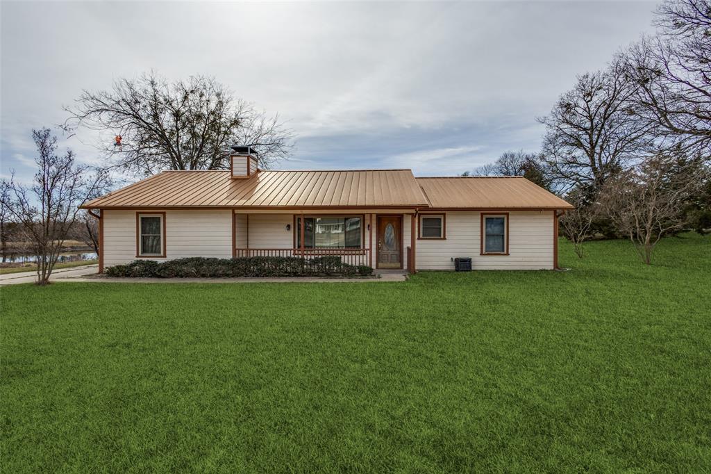 Beautiful home with 1.9 acres of land along with one third of a pond. A little interior updating needed, and you will have your dream home. The home has lots of potential. Fish in your back yard. The two sheds go with the property along with a riding lawn mower and a push mower.