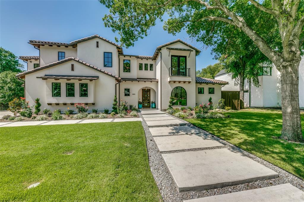 Modern Mediterranean built in 2021 on a half acre creek lot in Prairie Creek. 5 bedrooms: primary and 1 secondary ensuite down, 3 secondaries up, two ensuite. Open kitchen and living area overlook expansive tiered backyard with beautiful pool with water feature, putting green, outdoor kitchen and covered patio with heaters. Kitchen has 6 burner Bertazzoni gas range and griddle with double ovens, Dacor refrigerator, quartzite counters, cabinetry with custom storage. Oak hardwoods in common areas and bedrooms. Primary suite has beamed vaulted ceiling, double vanities, pedestal tub and large multi-head steam shower. Home office with closet. Stylish finishes include tile, lighting and plumbing fixtures. High-end energy efficient windows throughout with remote-controlled blackout shades. Laundry room with space for dual washers and dryers, butler’s pantry and mudroom provide ample storage. Second laundry room up. Flexible living area up has four built in bunk beds and is wired for media.