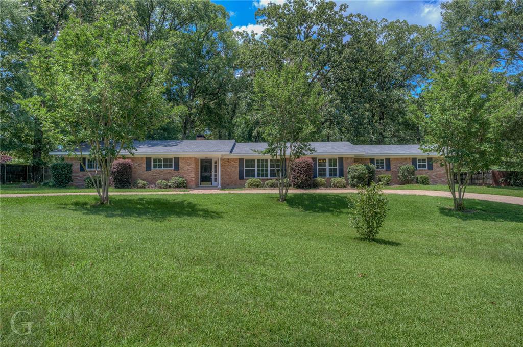 SELLER NOW OFFERING $5000 CLOSING COST OR UPDATE BONUS to any buyers who make an acceptable offer and close by January 15th 2024!!! Looking for a quiet neighborhood? Look no further than this 3 bedroom 3 bath home with 2800 heated sqft. This home features a main living and dinning area. The living room has a wood burning fireplace with built in cabinetry and a large window looking into the beautiful back yard. This home has a flex space off the kitchen. This room could be used as an additional bedroom, game room, den or more. It has its own full bathroom and small kitchenette, plus it has its own HVAC system. A great thing about this home, you don't have to be hot the next time the power goes out. It has a generator that turns on 10 seconds after the power goes out and can run the entire home. Electricity is Claiborne Electric as well. The storage building out back has electricity ran. 2 car carport! You don't want to miss out on this great home! Call your local agent TODAY!