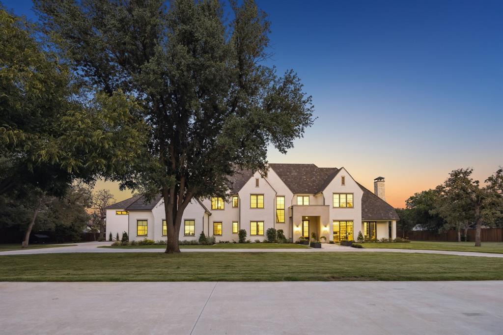 This private, gated estate spans on nearly 3 acres, offering an unparalleled blend of refined luxury and an elite active lifestyle. The exterior makes a timeless statement with custom tumbled brick and stone, a Ludowici clay tile roof, and copper gutters. Inside, the home exudes sophistication through soaring ceilings, wood accents, and level 4 smooth walls. Engineered oak hardwoods flow throughout the main level, leading to a gourmet kitchen anchored by premium quartzite countertops, Thermador appliances and catering kitchen. The spacious living area features a massive slider that connects seamlessly to a 3,000-square-foot travertine deck, a 50-foot gunite pool, and a sunken fire pit, including Zeon Zoysia-all serviced by a high-output private well.
The primary retreat serves as a true sanctuary, featuring pitched beam ceiling, a spa-like bath with a Toto Neorest NX1 toliet, and a massive walk-in closet with a dedicated washer and dryer. Designed for world-class entertainment, the home includes a first-floor game and media room with a 12.1 in-wall surround sound system, Sonos audio, and hardwired Lutron lighting and shades.
Uniquely designed for the ultimate athlete, the dedicated sports wing is virtually impossible to replicate. This massive complex includes an indoor Olympic trampoline room with a dome structure and shatterproof glass, a professional half-court basketball court with college-level maple flooring, and a state-of-the-art gym with floor-to-ceiling backyard views. For recovery and outdoor play, the estate features a custom-built Finnish sauna with WiFi-controlled heating and a full-size outdoor pickleball court equipped with a 3-light LED system for night games. With over 11,000 square feet,7 bedrooms, 9.2 bathrooms, and a 5-car garage, every detail of this estate has been mastered to provide a life of privacy, wellness, and effortless luxury.