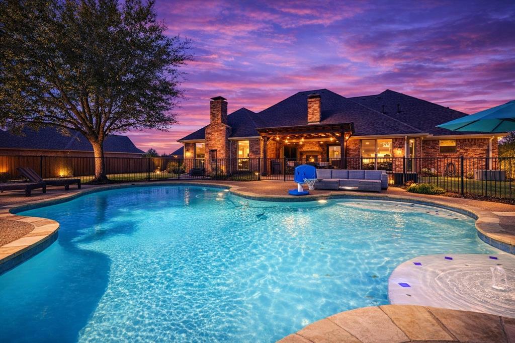 Welcome to luxury living with room to breathe! Situated on a pristine 1-acre lot, this stunning 5-bed, 4-bath home blends elegance, comfort, and functionality. From the extra-wide driveway and 3-car garage to the beautifully designed interior, every detail impresses.
Inside, you’ll find hand-scraped wood floors, abundant natural light, and 3” custom plantation shutters throughout. The chef’s kitchen is a true showstopper—featuring a massive island, incredible storage, and seamless flow into the main living areas, perfect for entertaining.
The split floor plan offers privacy, while the oversized primary suite is a true retreat with its own fireplace and generous space to unwind. Upstairs, enjoy a private guest haven or flex space complete with a full bedroom and bath.
Step outside to your resort-style backyard with a sparkling pool, expansive outdoor living area, and plenty of room to play, entertain, or even host a soccer game.

This is more than a home—it’s your everyday escape.