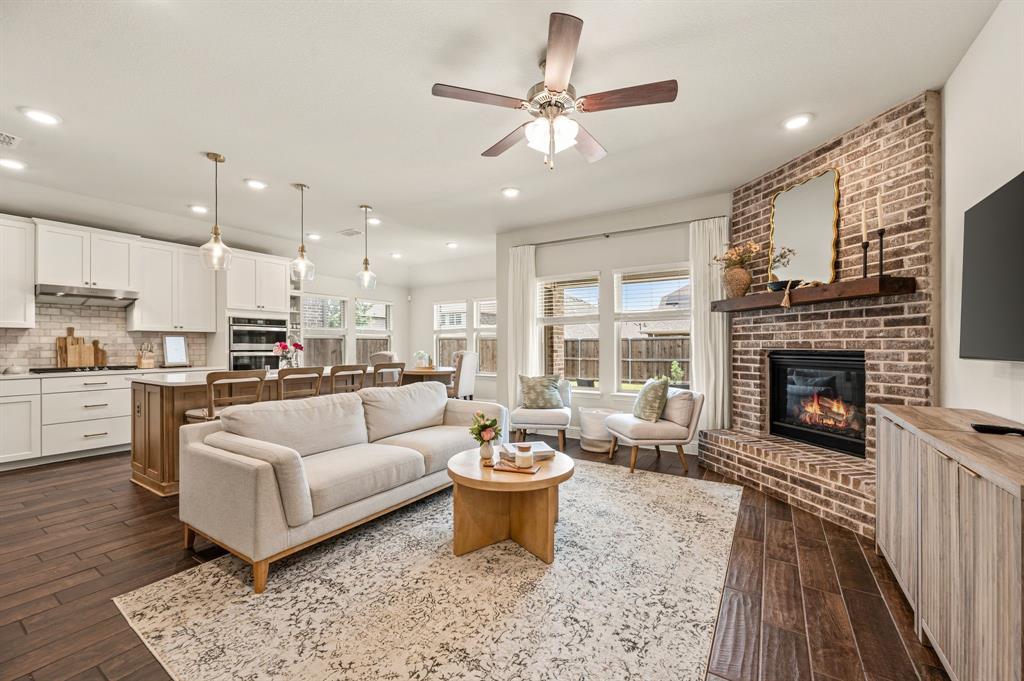 SEARCH YOUTUBE FOR A VIDEO OF THIS HOME! Welcome to 11809 Toppell Trail, where modern comfort, smart living & incredible community amenities come together in one exceptional home! Located in the highly sought-after master-planned community of Wellington & zoned to the HIGHLY rated Northwest ISD! This home offers the perfect blend of style, functionality & convenience in one of the area’s fastest-growing locations! From the moment you arrive, you’ll appreciate the inviting curb appeal & welcoming atmosphere that radiates throughout. The open-concept layout is designed for both comfortable everyday living & effortless entertaining. Spacious living areas filled with natural light create a bright & airy feel, while the thoughtfully designed 4-bedroom split floorplan provides flexibility for families, professionals or anyone looking for a home that truly fits today’s lifestyle. SMART HOME features add convenience & efficiency, & the LOW UTILITY COSTS make this home as practical as it is beautiful. Living in Wellington means enjoying an outstanding neighborhood lifestyle with resort-style amenities designed for connection, recreation & relaxation. Residents enjoy scenic ponds, beautiful parks, playgrounds, miles of walking trails, a resort-style community pool, a state-of-the-art clubhouse & pavilion areas complete with BBQ grills that are perfect for entertaining family & friends. One of the standout benefits of this home is the absence of both PID and MUD taxes while still offering premier amenities & beautifully maintained community spaces. The location is equally impressive with unbeatable proximity to Alliance Town Center, shopping, dining, entertainment & DFW Airport, making commuting & travel incredibly convenient while still allowing you to enjoy the peaceful charm of suburban living. Comfort, convenience, community & smart living all come together beautifully at 11809 Toppell Trail! This is more than just a home. It’s a LIFESTYLE buyers will absolutely love!