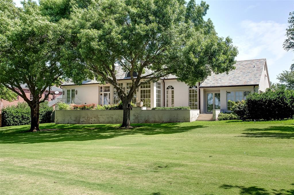 Experience luxurious living at 1200 Shady Oaks, located on the 8th green of the prestigious Shady Oaks Golf Course. This stunning estate boasts 3 spacious bedrooms, 4.2 luxurious bathrooms, and over 6,473 square feet of beautifully designed living space, all nestled on 0.315 acres.
Every detail in this home has been carefully crafted to create an atmosphere of elegance and sophistication. From the soaring ceilings to the exquisite finishes throughout, this home exudes luxury. The sprawling primary suite features a massive bedroom and bathroom with his and her vanities; giving plenty of storage and room to get ready. In addition to its stunning features and deluxe amenities, 1200 Shady Oaks offers one of the best views on the golf course, making it the perfect location for those who appreciate natural beauty and the finer things in life.