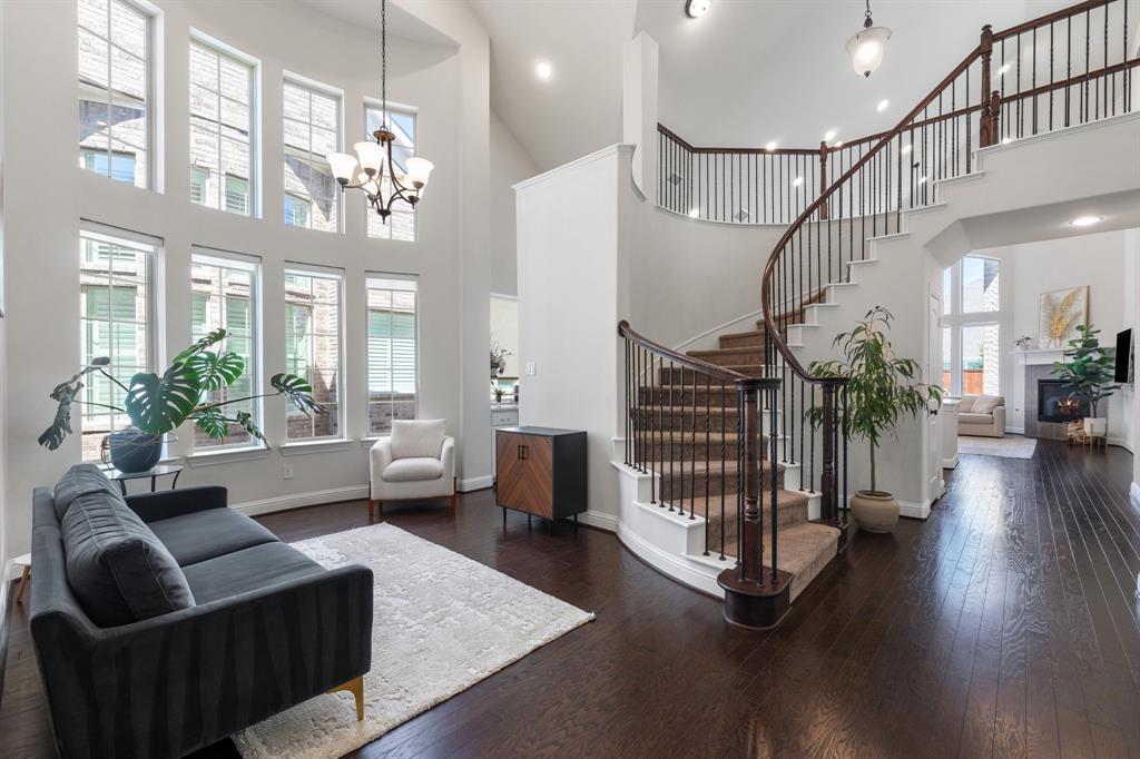 MOVE IN READY! Price Reduced by $30k!! This stunning 2019 build with soaring ceilings and an open-concept design boasts 5 beds and 4 baths within its 3314 square feet! If you prefer natural light AND west facing, this is the perfect home for you! Unique in design, the layout offers 3 beds & 2 full baths downstairs, with an option to make the 3rd bedroom down a dedicated home office. Perfect for multi-generational living or welcoming guests. The chef's dream kitchen showcases gorgeous white quartz & an abundance of counter space, crisp white shaker cabinetry, a 5-burner stainless steel gas cooktop with vent hood, and a soft & sophisticated backsplash with a mosaic accent trim. The kitchen seamlessly flows into the expansive open-concept living areas that are flooded with natural light and have automated shades. Escape to the luxurious primary suite, offering a tranquil retreat with a spa-like bath featuring a relaxing jetted tub, dual sinks, and a separate shower.  Upstairs, discover 2 additional bedrooms & 2 full baths, a versatile game room with built-in storage, and a media room.  Unwind on the covered patio in the peaceful, private backyard. Convenient access to Sam Rayburn Tollway & Hwy 75 makes commuting a breeze.  Just minutes to Gabe Nesbitt Community Park, Apex Centre fitness and aquatic facility, Bonnie Wenk Park and trails, and Eldorado Country Club, as well as shopping, dining, and everyday essentials at McKinney Towne Crossing.  Thoughtfully designed and perfectly situated, this home offers both charm and convenience!