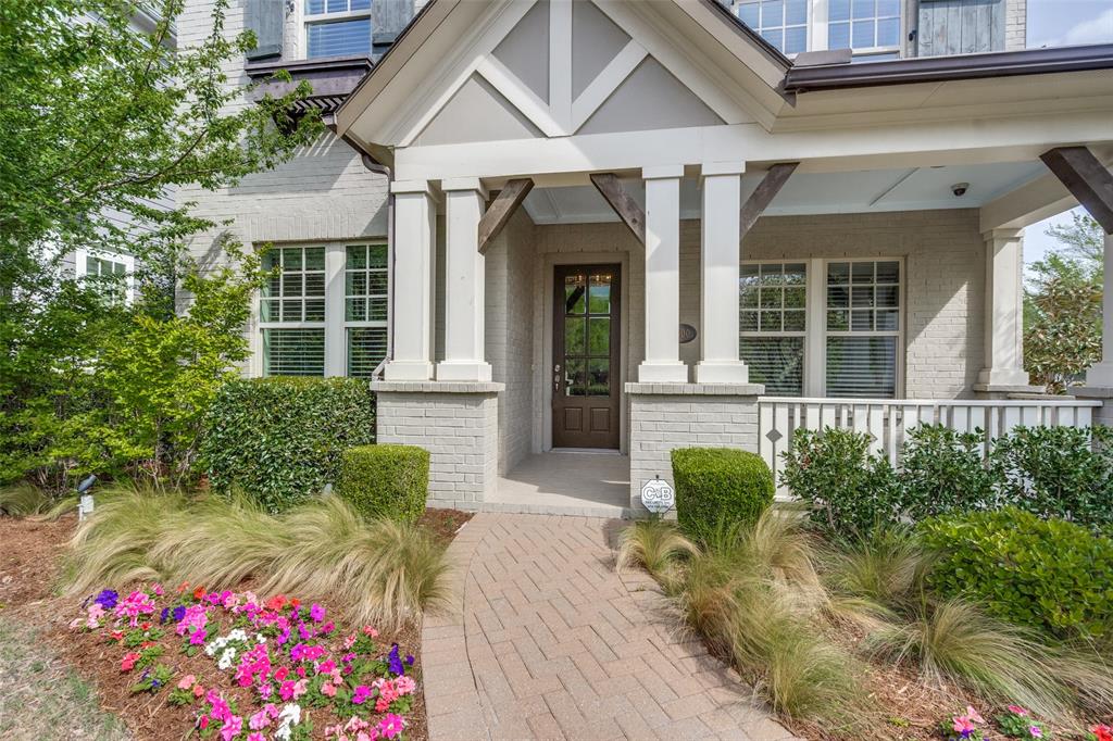 Former David Weekley Model Home sparkles with custom details in every room. This residence evokes timeless architectural charm with a welcoming front porch and premium finish-out. Beautiful hardwoods enhance the first-floor living areas, kitchen and primary suite. The private den serves as a perfect home office or flex space with elegant wainscoting. The heart of the home is a gourmet kitchen featuring crisp white cabinetry with glass inserts, a massive granite seating island, gas cooktop, stainless steel appliances and a walk-in pantry. Designer lighting add a sophisticated touch. The spacious family room is a true showstopper, featuring a vaulted shiplap ceiling and an impressive fireplace accented with custom tile. The primary retreat offers a spa-like bath with dual sinks, a large soaking tub, a dedicated linen closet, and a generous walk-in closet. Upstairs, the home features three spacious secondary bedrooms and two full bathrooms, including a convenient Jack-and-Jill layout. A large game room provides the perfect secondary living space for movies or game night. The exterior is designed for relaxation with an extended covered patio and built-in grill, plus an additional side yard for extra green space. The enlarged garage includes epoxy flooring and extra depth for storage or toys. Living in Tucker Hill means enjoying a lifestyle defined by community and luxury. Tucker Hill features a Residents’ Club with fitness center, a resort-style pool with zero-entry and splash fountains and the iconic Founders Square. Residents enjoy multiple parks and playgrounds, a dog park and a Lawn Chair Amphitheater for community concerts. The neighborhood is famous for its mature trees, lush green spaces and an extensive network of paved hike and bike trails and a full-time lifestyle coordinator planning year-round events. This home offers a vibrant community experience in the highly sought-after Prosper ISD.