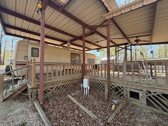 It's lake season and Lake Fork is the perfect place to spend a day or two enjoying life!   Just a short walk or golf cart ride to the water. A total of 4 lots stretching from PR 5808 to PR 5809 providing you with access from both sides.  Tall trees for shade.  Covered concrete pad to bring in a camper or tiny house.   The 1987, well maintained, Fleetwood RV on site complete with huge deck is included with the lots.  Water and electricity on site. Holding tanks permissible with HOA approval.  Storage building to store lake toys.  The over-sized deck makes for a great place to entertain friends and family or just watch the world go by.  Sun Eagle Bay is a gated lake community with amenities provided with paid HOA dues include swimming pool, boat ramps, fishing pier, playground, picnic area. restrooms and dump station.  Lake Fork is know for its premier bass fishing, so bring your boat and have some fun!  Just an hour and a half from the DFW area making this a great way to get away from the noise and congestion of city life.