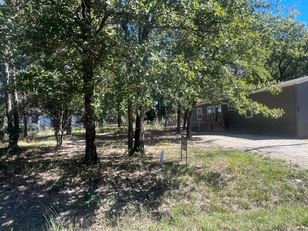 This peaceful neighborhood offers boating, fishing, and a community pool, making it an ideal retreat for relaxation and outdoor fun. Conveniently located, this Land provides easy access to shopping. Lot that is cleared and ready to build a single family or jut put a  mobile homes. all utilities are off of the street Cherokee Shores is an established subdivision with community pool and boat ramp
