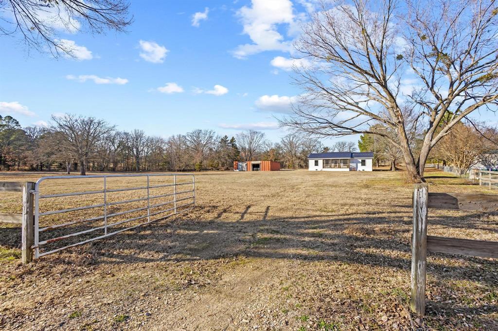 Discover true country living near Bois d'Arc Lake in Telephone, TX, a rare 16.36-acre property offering space, privacy, and exceptional recreational access. This recently upgraded 3-bedroom, 2-bath home features 1,152 square feet of comfortable living space. It is located less than half a mile from the North Boat Ramp, making it ideal for boating, fishing, and outdoor enthusiasts seeking land near the water.
The property showcases a beautiful mix of open pasture and mature trees, creating endless possibilities for horses, livestock, hobby farming, hunting, or recreational use. With ample acreage and minimal restrictions, this land is perfectly suited for a homestead, weekend retreat, or investment opportunity near one of North Texas’s most sought-after new lakes.
Inside, the recently updated home offers a functional open layout with central heating and air, an electric cooktop, and included appliances — making it move-in ready for full-time living or seasonal use. The manageable footprint and peaceful setting make this an excellent option for buyers seeking low-maintenance country living with room to expand. 
Conveniently located with easy access to Highway 82, the property provides quick travel to Sherman, Paris, and the DFW area while maintaining a quiet rural atmosphere. Additional nearby recreation includes Caddo National Grassland, Coffee Mill Lake, and Crockett Lake — offering fishing, hiking, hunting, camping, and year-round outdoor adventure. Let’s not exclude the multiple nearby casinos that provide convenient entertainment options, just a short drive away.
Located in Fannin County within Sam Rayburn ISD, this property presents a rare opportunity to own acreage near premier lake access with privacy and unlimited potential.