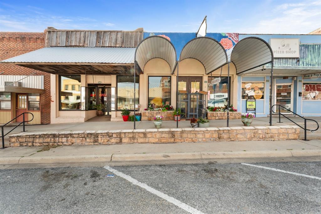 Rare opportunity to own a fully operating, turn-key business in the heart of De Leon! Price’s Flowers is now available—an established floral and gift shop offered at a great price and ready for a seamless takeover. With long-term local history and a trusted name in the community, this business has been part of life’s biggest moments for generations—birthdays, anniversaries, holidays, celebrations, and heartfelt “just because” gift giving.
With in this beautiful historic downtown building, the charming storefront provides strong visibility, walk-in traffic, and a warm, inviting shopping experience. In addition to in-person sales, the business includes an online store, shipping services giving you the ability to serve customers both locally and beyond. Let’s not forget the new windows and roof. Step in, continue the legacy, and make it your own from day one! Building at 141 may be purchased also.