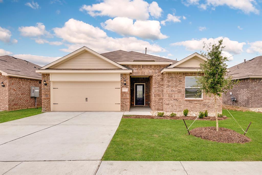 This incredible four-bedroom, two-bathroom home offers spacious living and thoughtful upgrades throughout. From the stunning brick exterior and professional front yard landscaping to the fully fenced backyard, this home has standout curb appeal and outdoor charm. Inside, the open layout features a large entertaining space and a beautifully upgraded kitchen complete with Whirlpool® appliances, designer wood cabinetry, granite countertops, flush mount LED lighting, and a convenient USB outlet. The private master suite boasts natural light, a walk-in closet, and an extended shower for added comfort. High-tech features include a Wi-Fi-enabled garage door opener, programmable thermostat, and energy-efficient double-pane Low-E vinyl windows. Ideally located within walking distance from the neighborhood playground, gazebo, and private community splashpad, this home combines comfort, convenience, and access to family-friendly amenities.