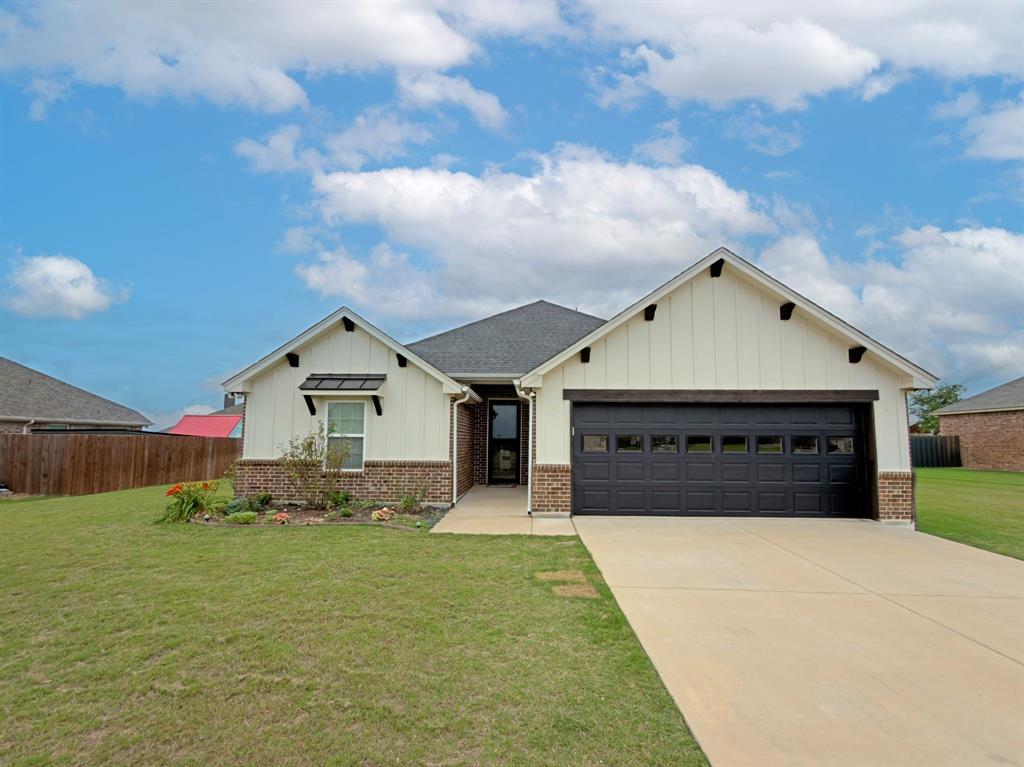 Well-maintained and move-in ready, this 3-bedroom, 2-bath home in Meander Estates offers a spacious open-concept layout designed for both everyday living and effortless entertaining. The inviting living room features a cozy fireplace and flows seamlessly into the kitchen and dining area, creating a comfortable central gathering space.
The kitchen includes a breakfast bar, walk-in pantry, and abundant cabinet storage—ideal for meal prep, hosting, and staying organized. The private primary suite features an en-suite bathroom with dual vanities, a garden tub, separate shower, and a large walk-in closet with extensive shelving.
The utility room doubles as a mudroom and offers space for a full-size washer and dryer, plus built-in seating, cabinetry, and extra storage to keep everything tidy.
Step outside to a fully fenced backyard complete with a covered patio and a flagstone extension—perfect for grilling, relaxing, or entertaining friends and family.
Additional highlights include a 2-car garage, thoughtful design throughout, and a convenient location close to shopping, dining, schools, and everyday essentials. This home blends style, function, and comfort into one inviting package.