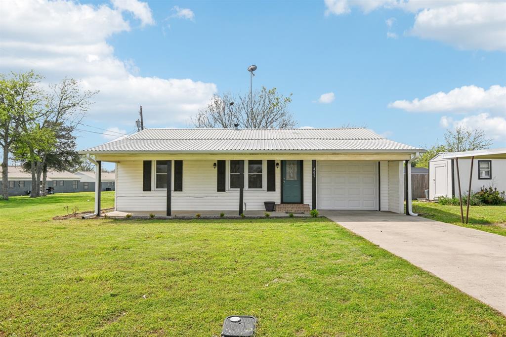Charming Fully Remodeled 3 Bedroom, 2 Bath Home in Leonard! This beautifully updated traditional farmhouse inspired home is move in ready and offers modern comforts with timeless charm. Featuring three bedrooms and two bathrooms, this home has been thoughtfully remodeled with quality upgrades throughout. Key features include a new metal roof & windows, ensuring durability and energy efficiency. Updated HVAC (2020) with central air and heat for year-round comfort and energy efficiency. Luxury vinyl flooring that is stylish and low maintenance throughout the home. A gorgeous kitchen with new cabinets, granite countertops, and modern appliances. A perfectly sized pantry has been added for extra storage. A flexible living space makes for the ideal formal living room, dining room, or home office. Enclosed 1 Car Garage that includes a wifi enabled garage door opener for convenience. The spacious backyard is the perfect space for kids, pets, or entertaining. Two storage buildings are perfect for extra storage or a workshop. Located in a quiet and welcoming neighborhood, this home is perfect for anyone looking for modern updates in a peaceful setting. Don’t miss the opportunity to make it yours!