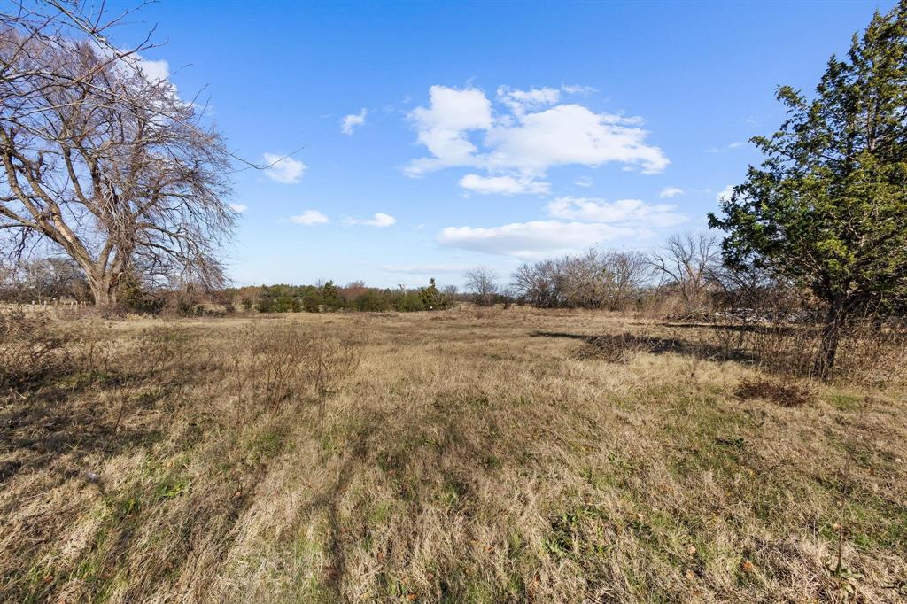 Exceptional opportunity to own 2.36 acres of improved land just outside the city limits of Denison. This versatile property features an existing barn with electric, ideal for equipment storage, tractor storage, livestock shelter, agricultural use, hobby farming, 4-H projects, workshop space, and recreational use. The level acreage offers ample room to expand while enjoying the flexibility of country living. Located along FM 120 with excellent road frontage, this outside-city-limits, no-HOA property provides convenient access to Highway 69, downtown Denison, and US Highway 75. Whether you're seeking a hobby farm, agricultural property, investment tract, rural retreat, build-ready acreage, or land with a barn and utilities already in place, this Grayson County property offers outstanding potential in a rapidly growing area.