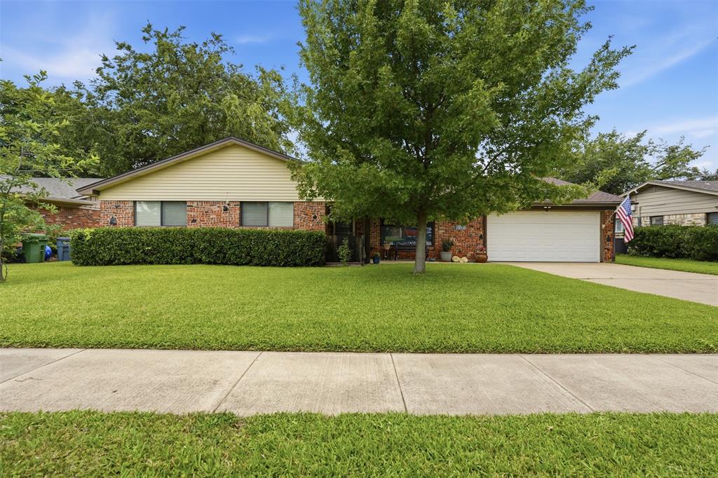 Welcome to this beautifully updated 3-bedroom, 2-bath home in the desirable Holiday East neighborhood, offering the perfect blend of comfort, style, and functionality. Designed for modern living, the open-concept floor plan seamlessly connects the main living spaces, creating an inviting atmosphere for everyday living and entertaining.  The updated kitchen is a standout feature, showcasing granite countertops, a farmhouse sink, stainless steel appliances, a warm wood island, and abundant cabinetry for exceptional storage and workspace. Multiple living areas provide flexibility for gatherings, relaxation, or work-from-home needs, including a cozy den accented by a brick fireplace wall that adds character and warmth. Both bathrooms have been thoughtfully renovated with modern finishes and contemporary design. An oversized utility room offers additional storage and convenience. Situated on an expansive quarter-acre lot, the outdoor space is equally impressive. Enjoy year-round entertaining on the covered back patio overlooking the spacious backyard. A storage shed and dedicated dog run add practicality and make the property ideal for pet owners, hobbyists, or anyone seeking extra outdoor space. Ideally located within walking distance of Holiday Heights Elementary School and nearby neighborhood trails, this home offers convenient access to outdoor recreation, schools, and everyday amenities. With stylish updates, generous living areas, a large lot, and a prime location in an established neighborhood, this Holiday East gem is ready to welcome you home.