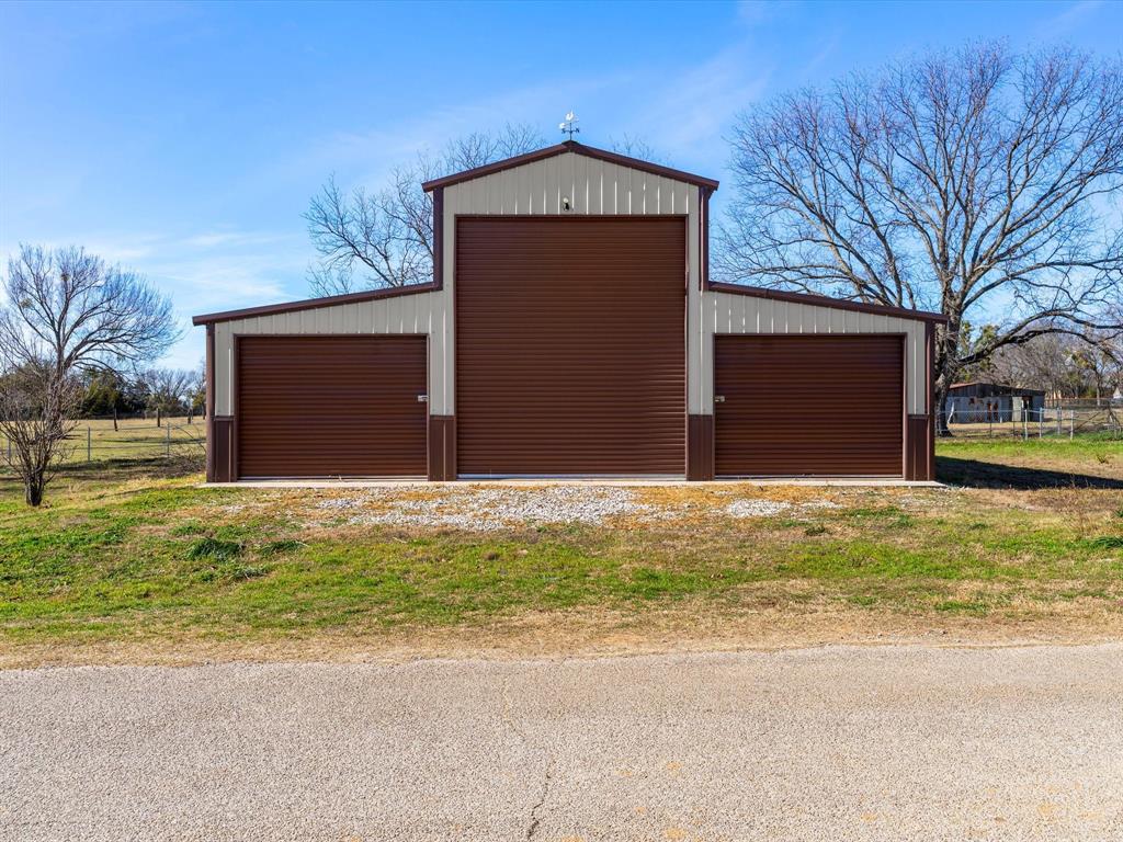 Versatile, improved acreage located in the heart of Boyd offering an excellent opportunity for buyers seeking usable land with valuable infrastructure already in place. The property features a substantial 38x40 foam-encapsulated workshop, ideal for equipment storage, hobby farm or future build, designed for year-round efficiency and comfort. This tract is improved land with access to city water and sewer, a rare advantage that reduces development costs and timelines. Open pasture provides good grazing potential and functional space for recreational use or horses, chickens, goats or future residential plans. Conveniently located with a true Texas feel, this property offers flexibility for personal use or investment with infrastructure already in place. A strong option for cash buyers seeking land with immediate usability and long-term upside. Schedule a private showing to explore the possibilities.