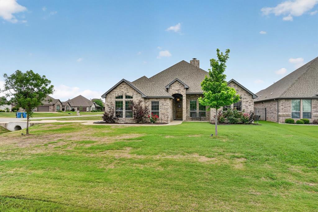 Welcome to Mayfair South living at its finest... where space, style, and freedom come together on a beautiful half-acre corner lot with NO city taxes.

This custom-built Steve Hawkins home stands out from the moment you arrive, offering that rare like-new feel without the wait. Inside, the open-concept design creates an easy, natural flow... perfect for both everyday living and hosting the people you love most.

At the center of it all is a stunning kitchen made for gathering, featuring quartz countertops, custom cabinetry, and an oversized island that invites conversation, connection, and memorable moments.

Step outside, and the lifestyle only gets better. Start your mornings on the inviting front porch and wind down in the evenings on the covered back patio. The custom stone fire pit sets the stage for cozy nights, entertaining friends, and enjoying wide-open Texas skies.

Located just minutes from the Chisholm Trail Parkway, you’ll enjoy quick access to shopping, dining, and an easy commute to downtown Fort Worth—while still coming home to peace, space, and privacy.

Now ready for its next owner, this is the kind of home that doesn’t come along often. Come experience it in person and see why it feels like home the moment you walk in.